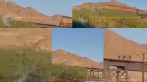 Migrantes se salvan de ser arrollados por un tren en la frontera.