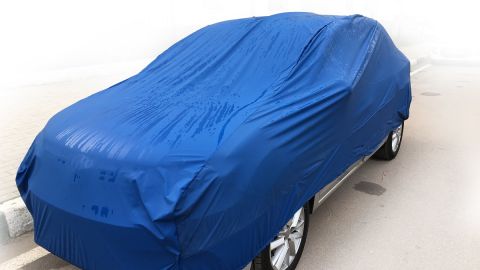 Auto cubierto por funda