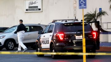 TORRANCE, CALIFORNIA - JANUARY 05: Police investigate the scene of a shooting that left three men dead and four injured at Gable House Bowl on January 5, 2019 in Torrance, California. Witnesses said a large group of people were bowling together when a fight erupted which led to the shooting. (Photo by Mario Tama/Getty Images)