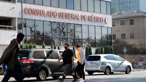 Pedestrians walk past the Consulate General of Mexico in Los Angeles, California on October 16, 2020, a day after former Mexican Secretary of Defense Salvador Cienfuegos was arrested at Los Angeles International Airport at the request of the US Drug Enforcement Administration. - Former Mexican defense minister Salvador Cienfuegos has been charged with drug trafficking and laundering money while he was in the government, documents released by federal prosecutors in New York on October 16, 2020 said. (Photo by Frederic J. BROWN / AFP) (Photo by FREDERIC J. BROWN/AFP via Getty Images)