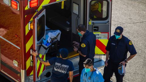 After administering him with oxygen, County of Los Angeles paramedics load a potential Covid-19 patient in the ambulance before transporting him to a hospital in Hawthorne, California on December 29, 2020. - The new variant of coronavirus was detected for the first time today in the United States and Latin America as President-elect Joe Biden vowed to significantly ramp up the vaccination drive. The coronavirus has killed at least 1,775,272 people since the outbreak emerged in China in December 2019, according to an AFP tally on December 29 based on official sources. The United States is the worst-affected country with 334,967 deaths, followed by Brazil with 191,570. (Photo by Apu GOMES / AFP) (Photo by APU GOMES/AFP via Getty Images)