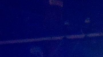 Police officers stand outside an office building were multiple people were killed in a shooting in Orange, California on March 31, 2021. - Authorities said that four people, including a child, were killed in a shooting and two others had been transported to local hospitals. The suspect is in custody and was also taken to the hospital. When officers arrived, the shots were still being fired and the police found several victims, said the police, who indicated that the situation had resulted in an officer-involved shooting. (Photo by Patrick T. FALLON / AFP) (Photo by PATRICK T. FALLON/AFP via Getty Images)