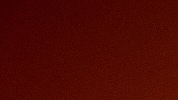 GOLETA, CA - OCTOBER 12: A firefighter hoses down a hot spot while battling the Alisal Fire at night on October 12, 2021 near Goleta, California. Pushed by high winds, the Alisal Fire grew to 6,000 acres overnight, shutting down the much-traveled 101 Freeway along the Pacific Coast. (Photo by David McNew/Getty Images)