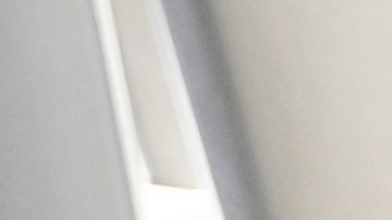 A customer returns a nozzle to a pump after fueling gasoline into a sport utility vehicle (SUV) at a Shell gas station in the Chinatown neighborhood of Los Angeles, California, on February 17, 2022. - In Los Angeles County, a new record for gas prices has now been set for the 11th time in 12 days. The average price of a gallon of self-serve regular is now $4.77 per gallon, up more than 10 cents over the past 16 days. (Photo by Patrick T. FALLON / AFP) (Photo by PATRICK T. FALLON/AFP via Getty Images)