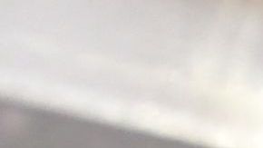 A man wears his mask as he walks past a sign posted on a storefront reminding people to wear masks, on February 25, 2022 in Los Angeles, - Los Angeles ends its indoor mask mandate on February 25 for the fully vaccinated and can show proof. The wearing of masks indoors remains for the unvaccinated and fail to show proof of a negative test. (Photo by Frederic J. BROWN / AFP) (Photo by FREDERIC J. BROWN/AFP via Getty Images)