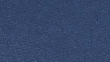 Saúl Álvarez y su entrenador Eddy Reynoso con los cinturones de campeón supermediano.