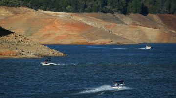 REDDING, CA - AUGUST 30: Low water levels are visible on the banks of Shasta Lake on August 30, 2014 in Redding, California. As the severe drought in California continues for a third straight year, water levels in the State's lakes and reservoirs is reaching historic lows. Shasta Lake is currently near 30 percent of its total capacity, the lowest it has been since 1977. (Photo by Justin Sullivan/Getty Images)