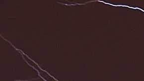 Lightning brightens the night sky over Washington, DC, during a rainstorm on April 20, 2015. AFP PHOTO / MLADEN ANTONOV (Photo by Mladen ANTONOV / AFP) (Photo credit should read MLADEN ANTONOV/AFP via Getty Images)