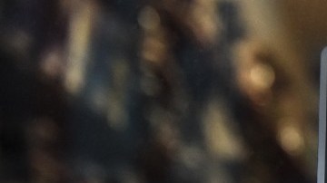 Un letrero de Juul lab en una tienda de productos de tabaco, con un anuncio de advertencia sobre el contenido de nicotina.