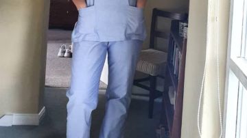 Enfermera latina criticada por que sus uniformes médicos resultan inapropiados por su curvilínea figura