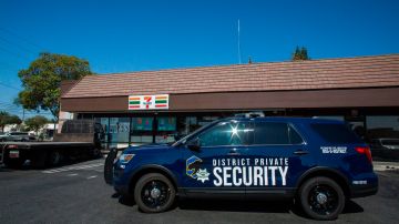 A private security car is seen in front of the 7-eleven shop in Santa Ana, California on August 08, 2019 where a security guard was fatally stabbed. - Police said the suspect, Zachary Castaneda, a 33-year-old resident of Garden Grove used multiple knives or machetes in the attacks that started yesterday afternoon. (Photo by Apu Gomes / AFP) (Photo credit should read APU GOMES/AFP via Getty Images)