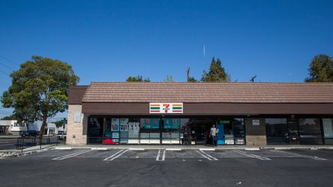 A man leaves the 7-eleven shop in Santa Ana, California on August 08, 2019 where a security guard was fatally stabbed. - Police said the suspect, Zachary Castaneda, a 33-year-old resident of Garden Grove used multiple knives or machetes in the attacks that started yesterday afternoon. (Photo by Apu Gomes / AFP) (Photo credit should read APU GOMES/AFP via Getty Images)