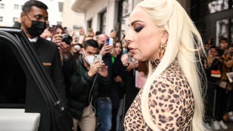 US singer and actor Lady Gaga walks past onlookers as she exits a hotel in Milan on November 13, 2021, ahead of the Italian premiere of the film 'House of Gucci'. (Photo by Piero CRUCIATTI / AFP) (Photo by PIERO CRUCIATTI/AFP via Getty Images)