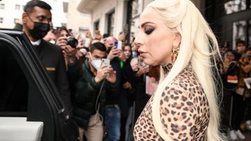 US singer and actor Lady Gaga walks past onlookers as she exits a hotel in Milan on November 13, 2021, ahead of the Italian premiere of the film 'House of Gucci'. (Photo by Piero CRUCIATTI / AFP) (Photo by PIERO CRUCIATTI/AFP via Getty Images)