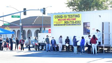 People wait in line for their Covid-19 test in Rosemead, California, on January 5, 2022. - The US recorded more than 1 million Covid-19 cases on January 3, 2022, according to data from Johns Hopkins University, as the Omicron variant continues to spread at a blistering pace. (Photo by Frederic J. BROWN / AFP) (Photo by FREDERIC J. BROWN/AFP via Getty Images)