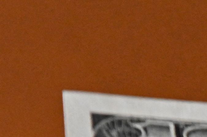 US dollar notes are photographed in Buenos Aires, on June 23, 2022. - Argentines do their accounts in dollars, traumatised by recurrent economic crises and tormented by the inflation that is eating away at their pockets and is projected to exceed 60% this year. (Photo by Luis ROBAYO / AFP) (Photo by LUIS ROBAYO/AFP via Getty Images)