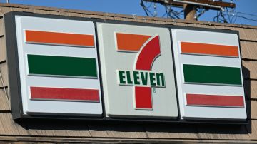 A sign outside a 7-Eleven store in seen in Glendale, California, July 11, 2022. - At least four robbery-shootings in the early morning hours of July 11, 2022 took place at southern California 7-Eleven stores, leaving two people dead and others injured, according to police. Authorities say the shootings appear to be related. (Photo by Robyn Beck / AFP) (Photo by ROBYN BECK/AFP via Getty Images)