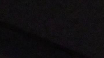 A pedestrian walks past a Starbucks closed for the day in Los Angeles, California on July 12, 2022. - Starbucks will close six locations in Los Angeles, including this one in downtown, by the end of the month. Company officials cite safety concerns for workers and customers as issues facing the nation, from racism to lack of access to health care to a growing mental health crisis, impact the coffee chain. (Photo by Frederic J. BROWN / AFP) (Photo by FREDERIC J. BROWN/AFP via Getty Images)