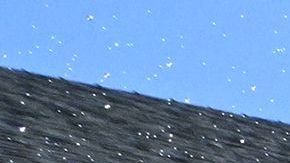 TOPSHOT - Despite water conservation regulations forbiding daytime watering, irrigation sprinklers jet water over a front lawn of degraded soil, July 12, 2022 during California's historic drought. - Authorities are encouraging residents to replace their lawns with waterwise gardens that requires very little irrigation by using native and non-native drought tolerant plants coupled with terraforming that captures rainwater, to save water amidst California's historic drought. (Photo by Robyn Beck / AFP) (Photo by ROBYN BECK/AFP via Getty Images)