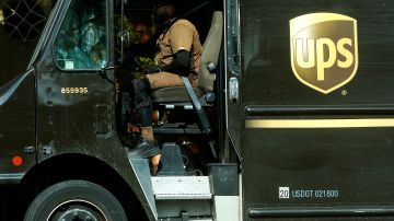 LOS ANGELES, CALIFORNIA - FEBRUARY 01: A UPS (United Parcel Service) driver operates a UPS delivery vehicle on February 1, 2022 in Los Angeles, California. UPS stock surged today to a record high after the delivery giant posted strong quarterly earnings amid a spike in online pandemic-driven shopping. (Photo by Mario Tama/Getty Images)