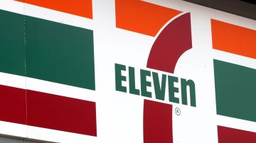 DES PLAINES, IL - MAY 9: A 7-Eleven store logo is visible outside a 7-Eleven store May 9, 2003 in Des Plaines, Illinois. Dallas, Texas-based 7-Eleven, Inc., the world's largest convenience store operator, reported on May 9, 2003 total sales for April 2003 of $897.0 million, an increase of 7.4 percent over the April 2002 total of $835.5 million, the 70th consecutive monthly increase in U.S. same-store sales. (Photo by Tim Boyle/Getty Images)
