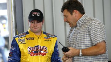 SPARTA, KY - JULY 7: Bobby East, driver of the #21 State Fair Corn Dogs/Edy's Dibs Ford, talks with former series driver Robert Pressley during the NASCAR Craftsman Truck Series Built Ford Tough 225 practice on July 7, 2006 at the Kentucky Speedway in Sparta, Kentucky. (Photo by Joe Robbins/Getty Images for NASCAR)