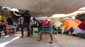 Inmigrantes en el refugio de Tijuana.