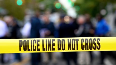 Police tape secures a crime scene outside a club after a shooting in Brooklyn on October 12, 2019. - At least four people died and three were wounded in a shooting at a social club in New York eary Saturday, police said. No one has been arrested over the shooting, which took place in Brooklyn, and the motive and exact circumstances are not known, a New York police official told AFP. The local affiliate of ABC News described the place where the shooting took place as an after-hours club. (Photo by Johannes EISELE / AFP) (Photo by JOHANNES EISELE/AFP via Getty Images)