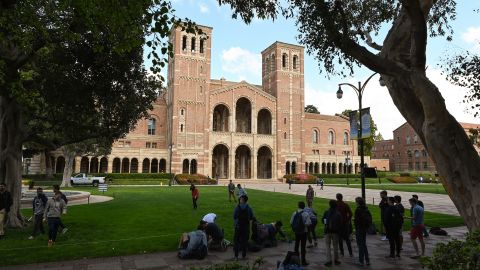 Students participate in an activity near Royce Hall (background) on the campus of University of California at Los Angeles (UCLA) in Los Angeles, California on March 11, 2020. - Starting this week many southern California universities including UCLA will suspend in-person classes due to coronavirus concerns. (Photo by Robyn Beck / AFP) (Photo by ROBYN BECK/AFP via Getty Images)