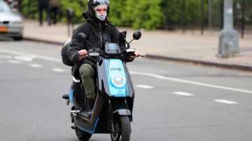 NEW YORK, NY - APRIL 23: A Revel electric moped is seen being driven on April 23, 2020 in the Clinton Hill neighborhood of the Brooklyn borough of New York City. New York City remains the epicenter of the coronavirus pandemic in the United States. (Photo by Mike Lawrie/Getty Images)