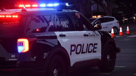 Beverly Hills police officers patrol in their car on November 1, 2020 in Beverly Hills. (Photo by Chris DELMAS / AFP) (Photo by CHRIS DELMAS/AFP via Getty Images)