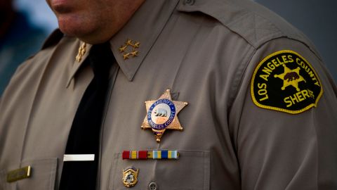 Sheriff Alex Villanueva of the Los Angeles Sheriff's Department (LASD) speaks about a task force targeting wage theft outside of the Hall of Justice on February 9, 2021 in Los Angeles, California. (Photo by Patrick T. FALLON / AFP) (Photo by PATRICK T. FALLON/AFP via Getty Images)