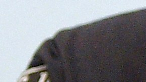 A judical officer brings handcuffed defendant Mohamed R. into the courtroom in Dresden, Germany, on March 15, 2022, for the continuation of the trial over a jewellery heist on the Green Vault (Gruenes Gewoelbe) museum in Dresden's Royal Palace in November 2019. - Six members of a notorious criminal gang, aged 22 to 28, are on trial in Germany over the spectacular heist in which 18th-century jewels were snatched from the state museum in Dresden. They are accused of gang robbery and arson after the brazen night raid on The Green Vault museum on November 25, 2019. (Photo by MATTHIAS RIETSCHEL / POOL / AFP) (Photo by MATTHIAS RIETSCHEL/POOL/AFP via Getty Images)