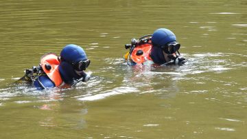 Divers from the French gendarmerie search a lake on August 29, 2014 in Chenerailles, central France, after a 4-month-old baby went missing on August 27. Investigations to find a 4-month-old baby who has been missing since August 27 in the Creuse, central France, which the parents claim has been abducted by a stranger, remained unsuccessful on August 29. AFP PHOTO / THIERRY ZOCCOLAN (Photo credit should read THIERRY ZOCCOLAN/AFP via Getty Images)
