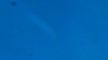 A pedestrian uses an umbrella on a hot sunny morning in Los Angeles October 24, 2017 amid a late season heatwave hitting southern California. Record temperatures in some locations including downtown Los Angeles reached 37 degrees Celsius (99 degrees Fahrenheit) before noon, tying a record set in 1909. / AFP PHOTO / FREDERIC J. BROWN (Photo credit should read FREDERIC J. BROWN/AFP via Getty Images)