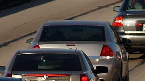 PASADENA, CA - DECEMBER 1: Morning commuters travel the 210 freeway between Los Angeles and cities to the east on December 1, 2009 near Pasadena, California. President Barack Obama will attend the international climate negotiations in Copenhagen next week with a vow to reduce US greenhouse gas emissions to about 17 percent below 2005 levels by 2020, and 83 percent by 2050. Meanwhile, California, which has some of the toughest clean air laws after decades of fighting some of the worst smog in the nation, is in the final phase of building a cap-and-trade market to provide incentives to reduce greenhouse emissions. More than 60 world leaders are expected to take part in the climate negotiations in Copenhagen. (Photo by David McNew/Getty Images)