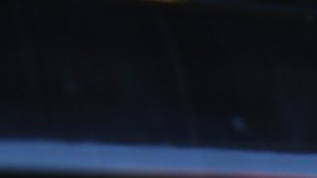 Imagen de una parrilla de un vehículo con el logotipo de Ford.