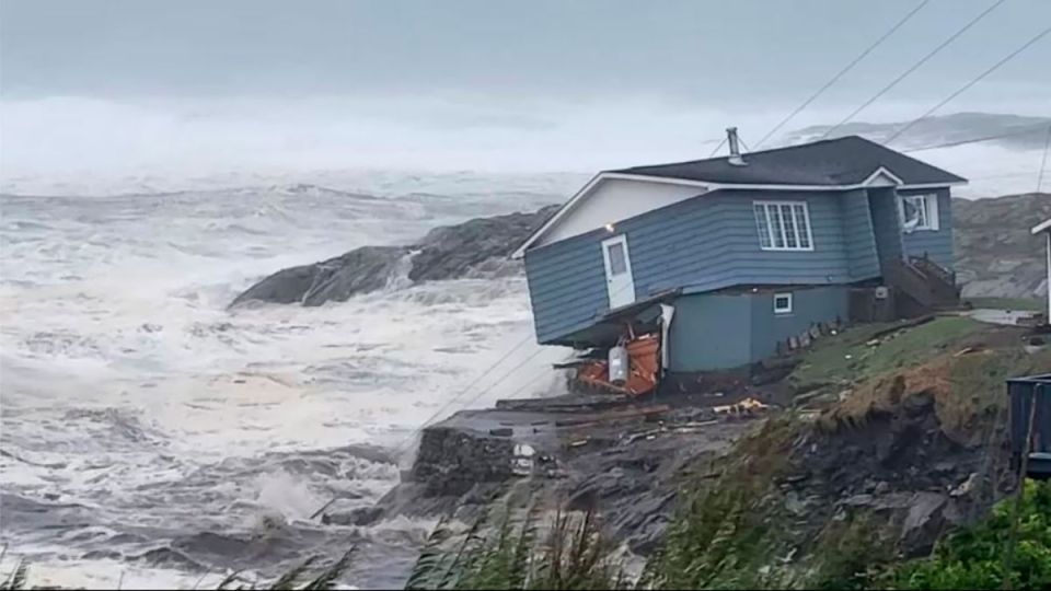 Storm Fiona leaves houses washed out to sea and thousands of people without power after its “historic” passage through Canada