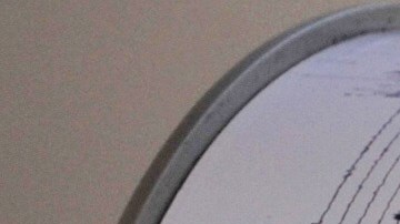 A geologist prepares his instruments to monitor the eruption of Mount Sinabung at their base in Surbakti village, Tanah Karo in North Sumatra on September 1, 2010. Thousands of Indonesians will spend their fourth day in evacuation centers as the volcano threatened a devastating eruption on Sumatra island, officials said. The mountain erupted for the first time in 400 years on August 29, 2010. AFP PHOTO / Bay ISMOYO (Photo credit should read BAY ISMOYO/AFP via Getty Images)