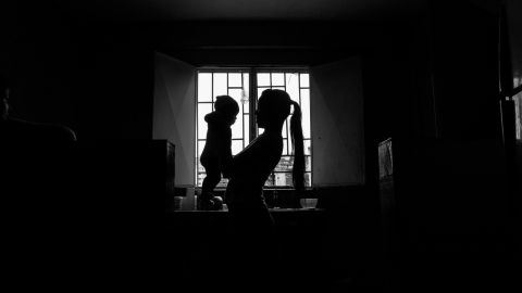 TOPSHOT - single mother Jessica Sanz (26) plays with her baby while taking care of him at her home in the Union neighborhood at the populous community of Petare in Caracas on August 30, 2020. - Infant mortality in Venezuela increased 30.12% in 2016, with 11,466 deaths of children aged 0 to 1 year, and maternal mortality soared 65%, according to the latest figures published by the Ministry of Health. (Photo by Yadira PEREZ / AFP) (Photo by YADIRA PEREZ/AFP via Getty Images)