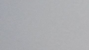 A pupil writes words in Breton on a whiteboard during a Breton teaching lesson at a Diwan bilingual school in Le Relecq-Kerhuon, western France on June 17, 2021. - Diwan schools are a federation of Breton-medium schools allowing children to learn French and Breton through language immersion. (Photo by Fred TANNEAU / AFP) (Photo by FRED TANNEAU/AFP via Getty Images)