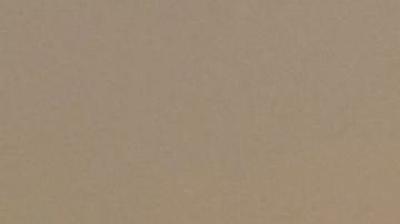 The sun sets behind people walking an afternoon hike in Los Angeles, California on July 12, 2021. - Wildfires were burning across more than one million acres of the western United States and Canada on July 12, 2021, as scorching temperatures held their grip on areas reeling from a brutal weekend heat wave. (Photo by Frederic J. BROWN / AFP) (Photo by FREDERIC J. BROWN/AFP via Getty Images)