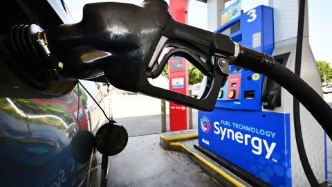 A gasoline nozzle pumps gas into a vehicle in Los Angeles, California on August 23, 2022. - US shoppers are facing increasingly high prices on everyday goods and services as inflation continues to surge with high prices for groceries, gasoline and housing. (Photo by Frederic J. BROWN / AFP) (Photo by FREDERIC J. BROWN/AFP via Getty Images)