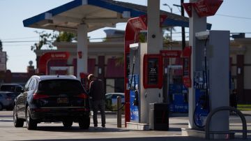 LOS ANGELES, CA - SEPTEMBER 21: A man pumps gas into his suv at an Exxon gas station on September 21, 2022 in Los Angeles, California. Gas prices have increased for the first time in almost 100 days. (Photo by Allison Dinner/Getty Images)