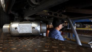 SAN RAFAEL, CALIFORNIA - JULY 11: A brand new catalytic converter sits on a car lift at Johnny Franklin's Muffler on July 11, 2022 in San Rafael, California. Thefts of catalytic converters are surging across the nation as thieves seek out precious metals like platinum, palladium and rhodium that fill the inside of the antipollution car part. Thefts have nearly tripled since the beginning of the pandemic with over 50,000 in 2021 compared to under 20,000 in 2020. Vehicle owners are having to pay thousands of dollars to replace the stolen parts and in some cases can't get the parts due to supply chain issues. (Photo by Justin Sullivan/Getty Images)