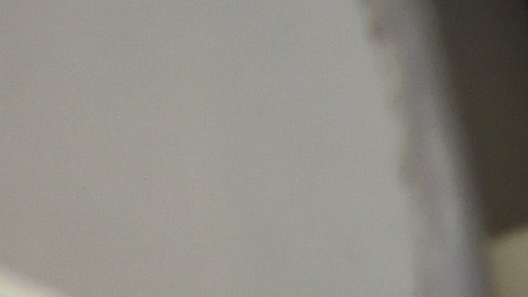 American Airlines longest serving flight attendant, Bette Nash (R), 81 years old, checks the passengers' seats for forgotten items before disembarking from her daily return flight to Boston at Ronald Reagan Washington Airport in Arlington, Virginia on December 19, 2017. American Airlines Flight 2160 from Boston has just arrived in Washington, D.C., and Bette Nash, 81, helps the passengers disembark. After six decades crossing the skies as a flight attendant, Nash still has impeccable style, incredible energy and a constant smile. In the United States, pilots must retired at 65 but there is no such restriction on commercial flight attendants, of which Bette Nash is probably the world's most senior. / AFP PHOTO / Eric BARADAT (Photo credit should read ERIC BARADAT/AFP via Getty Images)