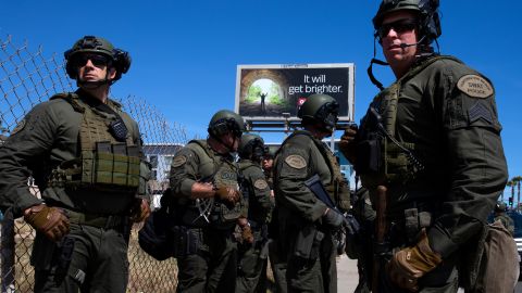 HUNTINGTON BEACH, CA - MAY 31: Huntington Beach SWAT team members stand ready for protesters after violent demonstrations in response to George Floyd's death on May 31, 2020 in Huntington Beach, California. California Governor Gavin Newsom has deployed National Guard troops to Los Angeles to curb the looting and destruction of property. Protesters have been demonstrating after video emerged of a Minneapolis police officer, Derek Chauvin, pinning Floyd's neck to the ground. Floyd was later pronounced dead while in police custody after being transported to Hennepin County Medical Center. The four officers involved in the incident have been fired and Chauvin has been arrested and charged with 3rd degree murder. (Photo by Brent Stirton/Getty Images)