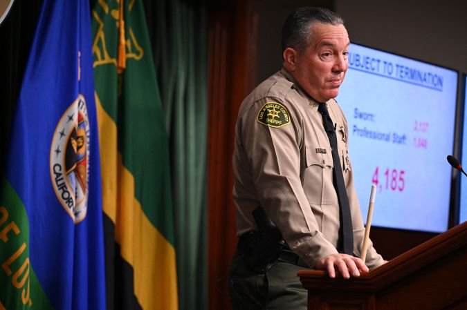 Los Angeles County Sheriff Alex Villanueva speaks at a press conference to address vaccine mandates -- which he calls an ``imminent threat to public safety'' if terminations occur in his department as a result of the mandates, November 2, 2021 at a press conference in downtown Los Angeles. (Photo by Robyn Beck / AFP) (Photo by ROBYN BECK/AFP via Getty Images)