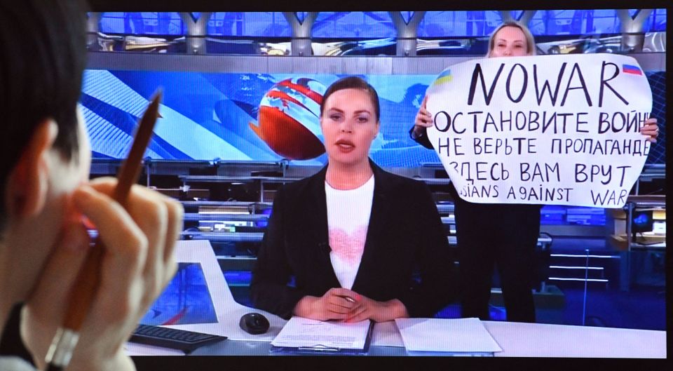 Russian Reporter Who Protested Ukraine Attack Flees Country to Avoid Prison