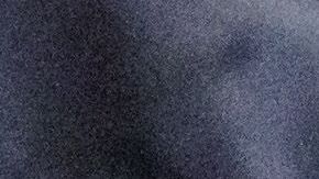 Defendant Wissam R (R) is led in handcuffs into the courtroom of the Higher Regional Court in Dresden, eastern Germany on August 30, 2022 prior to a hearing in the trial over a jewellery heist on the Green Vault (Gruenes Gewoelbe) museum in Dresden's Royal Palace in November 2019. - Six members of a notorious criminal gang stand trial in Germany over the spectacular heist in which 18th-century jewels were snatched from the state museum in Dresden. They are accused of gang robbery and arson after the brazen night raid on The Green Vault museum on November 25, 2019. (Photo by JENS SCHLUETER / POOL / AFP) (Photo by JENS SCHLUETER/POOL/AFP via Getty Images)